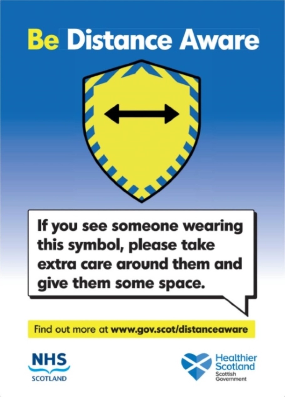 Distance Aware Poster reads - If you see someone wearing this symbol, please take extra care around them and give them some space.