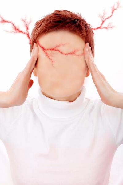 Illustration of a faceless person holding their head in their hands with simulated red lightening bolts coming from the head.