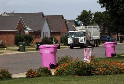 Southaven, Mississippi residents join the grassroots movement featuring pink garbage carts, enabling households nationwide to make a visible demonstration of their support for breast cancer awareness. (photo by Lance Murphey)
