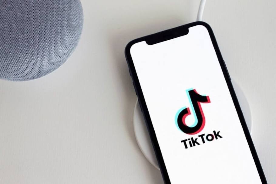 TikTok logo on a cell phone screen.