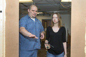 UC's Luis Favela explains a task to Mary Jean Amon during a demonstration of Favela's research experiment in the Perceptual-Motor Dynamics Lab.